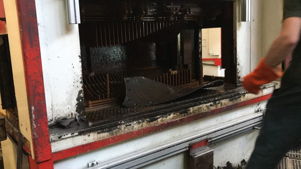 A plough board having been pressed into shape