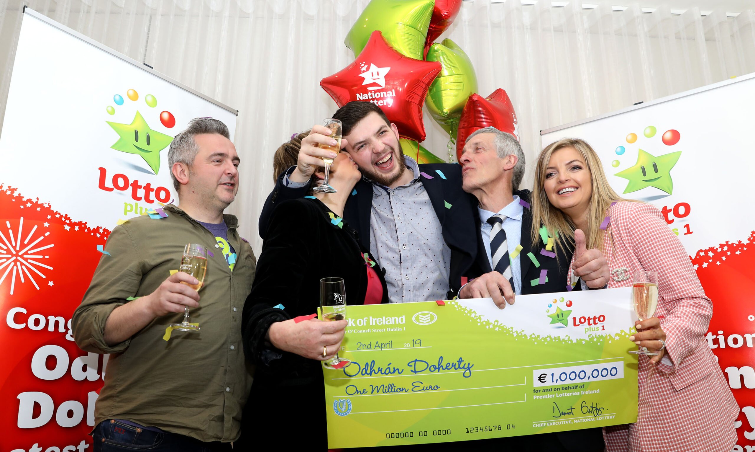 Odhrán with his brother Shane; his mum Margaret; dad Liam; and sister Lana at the Lottery HQ after collecting his winnings. Image source: Mac Innes Photography