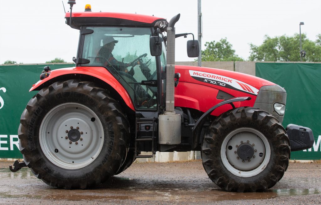 This 2013 McCormick X70.70 (50kph; air brakes; 5,660 hours) sold for £26,500