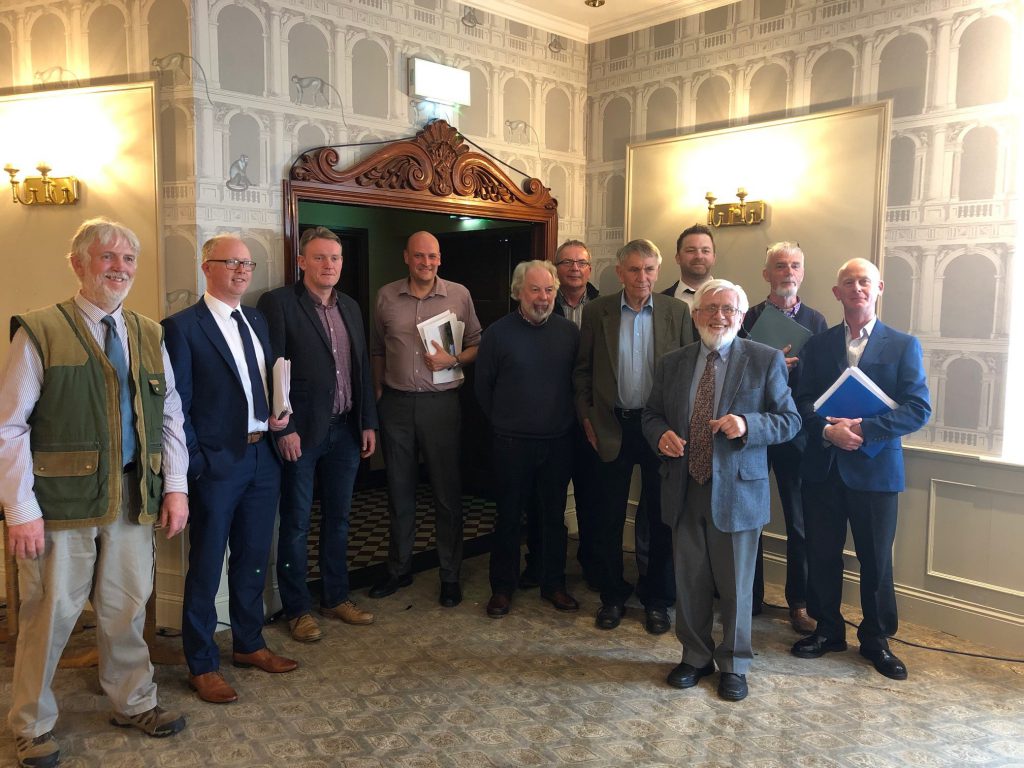 Members of the ‘No to Derryadd Wind Farm’ group with Prof. Alan Evans, Belfast and Fine Gael councillor Micheál Carrigy during last week’s oral hearing in Longford