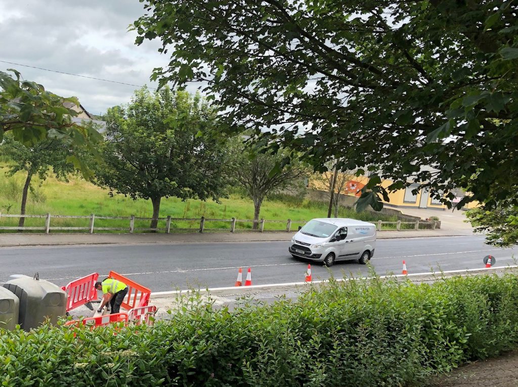 A vehicle approaching the village from the north side travels in the centre of the road because of roadworks