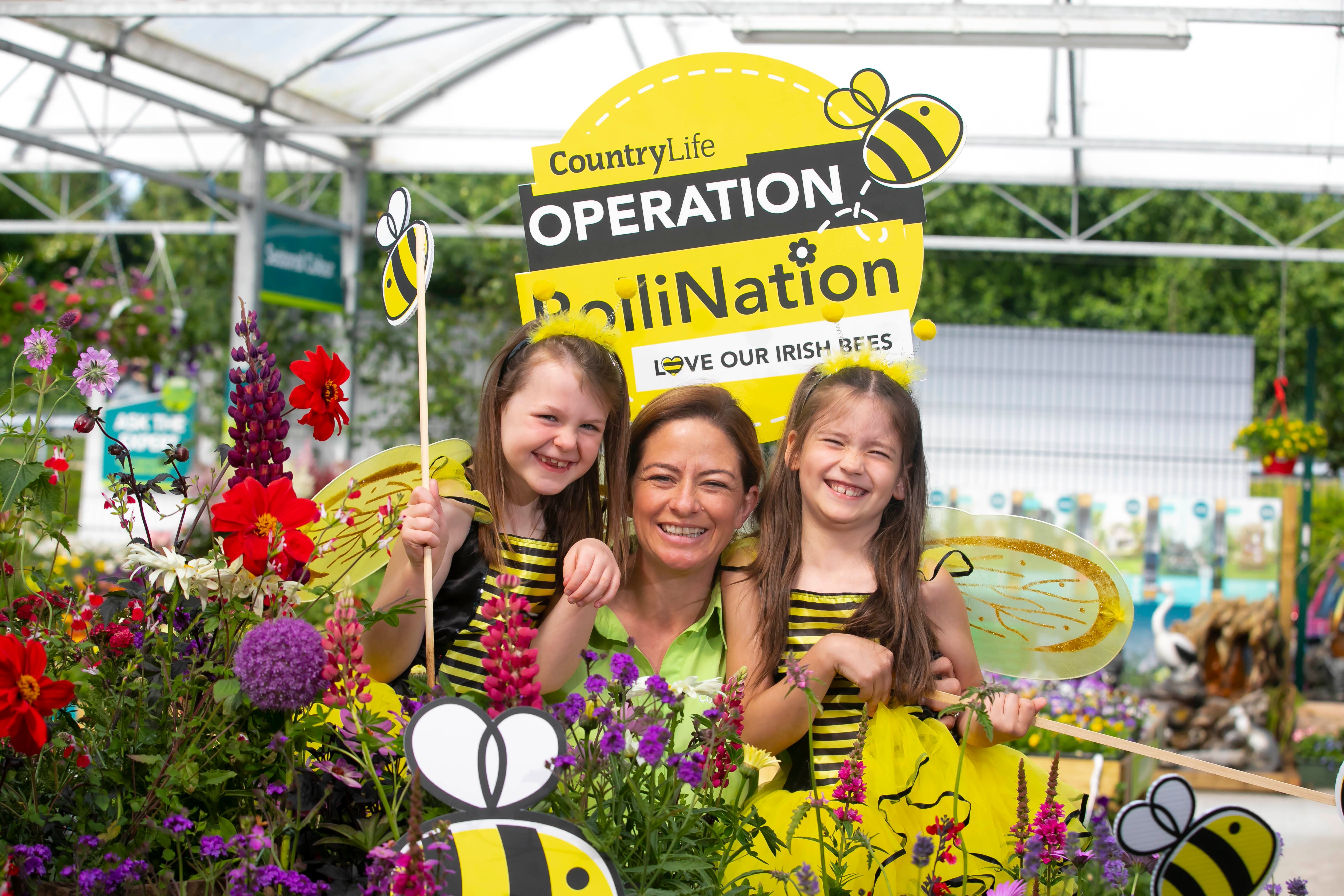 At the launch of the ‘Operation PolliNation’ programme were: CountryLife Castlecomer horticulturist Teresa Walsh with bumblebees, Sofia Moloney (6) and Pippa Wallace (7). Image source: Patrick Browne