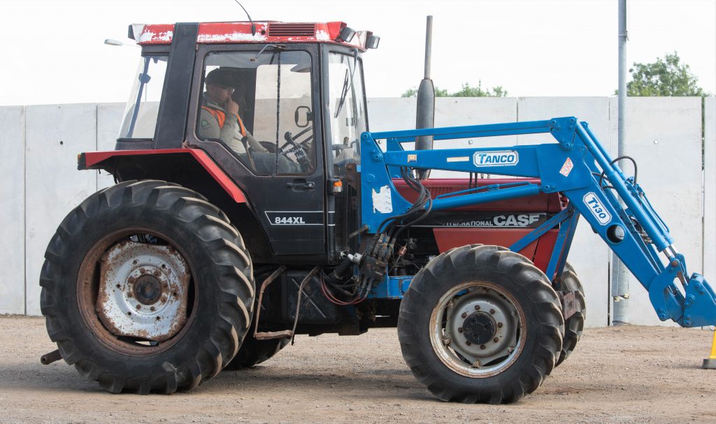 This Case IH 844XL (Tanco front loader; 6,936 hours) sold for £5,900