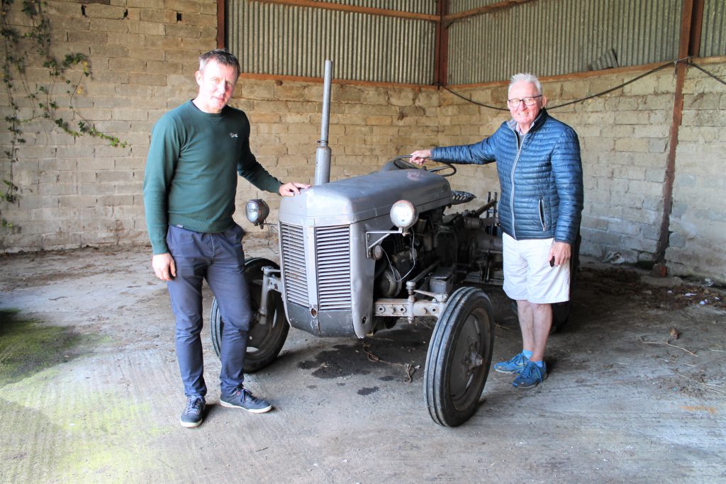 Justin McNulty pictured with his father, Joe, at the home farm in Lislea, south Armagh