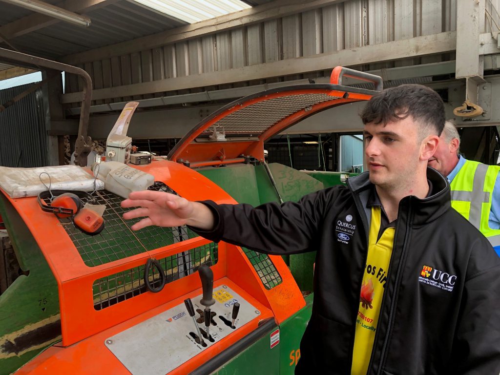 Nick Cotter works the processing machine