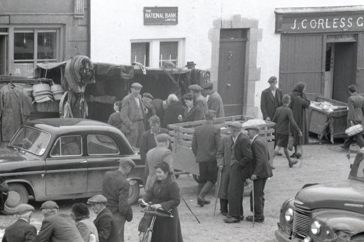 Fair day, Kinvara. Note the National Bank and J. Corless shop in the background – courtesy of the Robert Cresswell Archive. Gift of Robert Cresswell