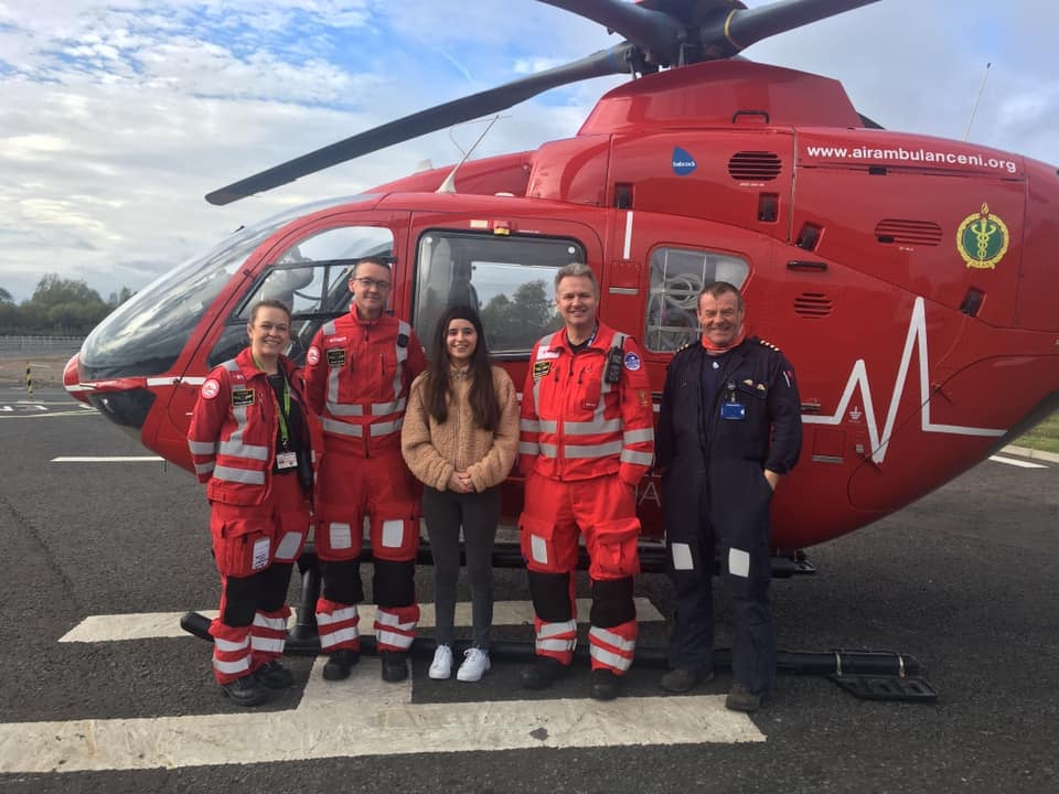 Ellie McDonnell (pictured centre) with the Air Ambulance NI crew