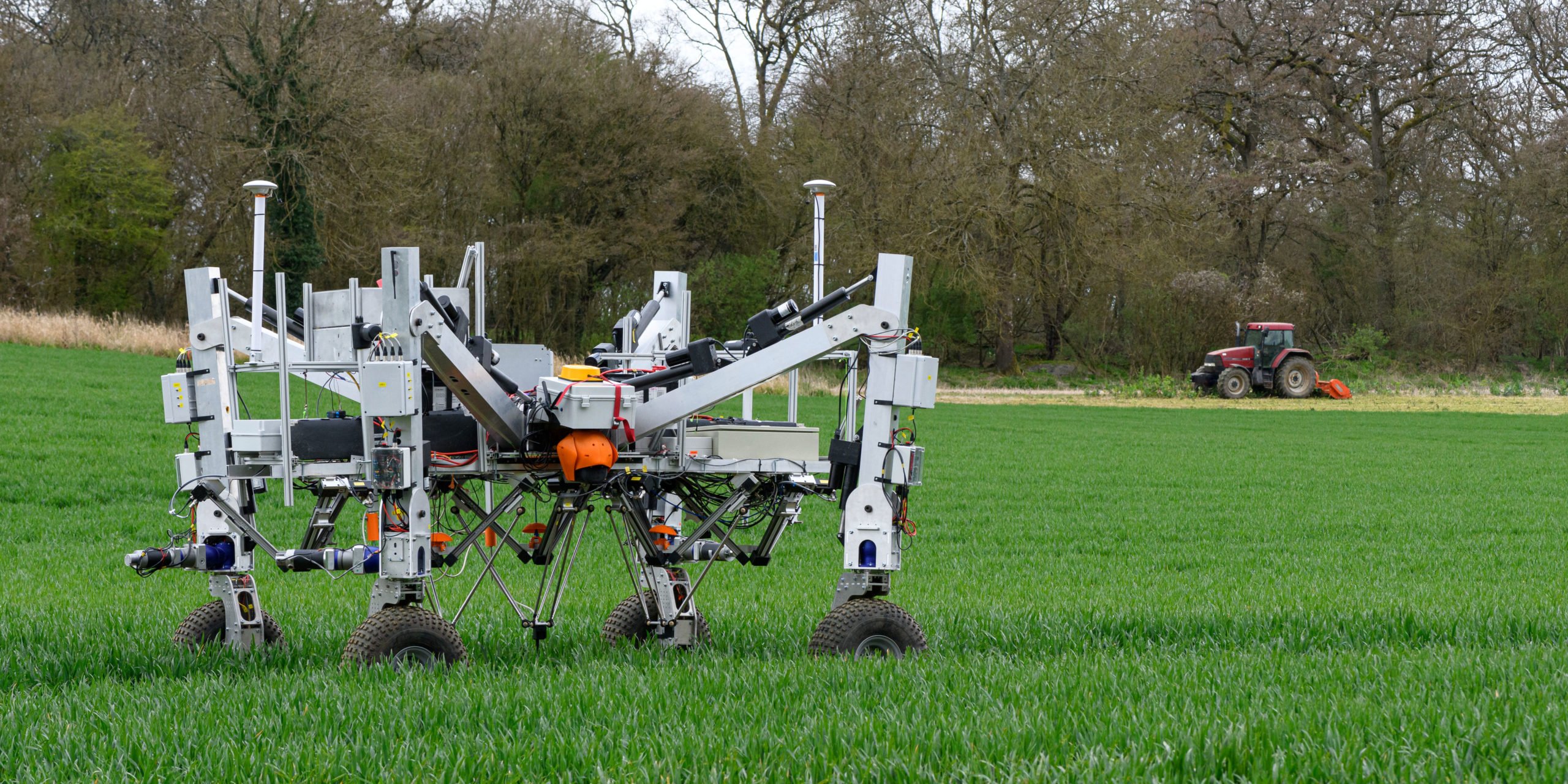 Robots and tractors are likely to be working together well into the future