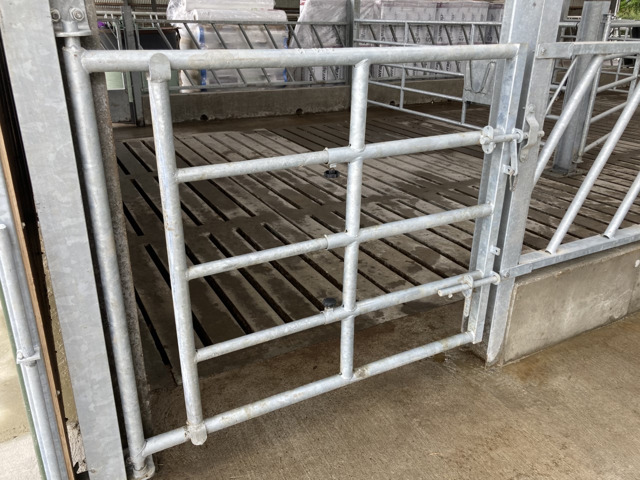 The creep gates in the new unit can be conracted to allow calves come and go from the slatted area to the dry pens