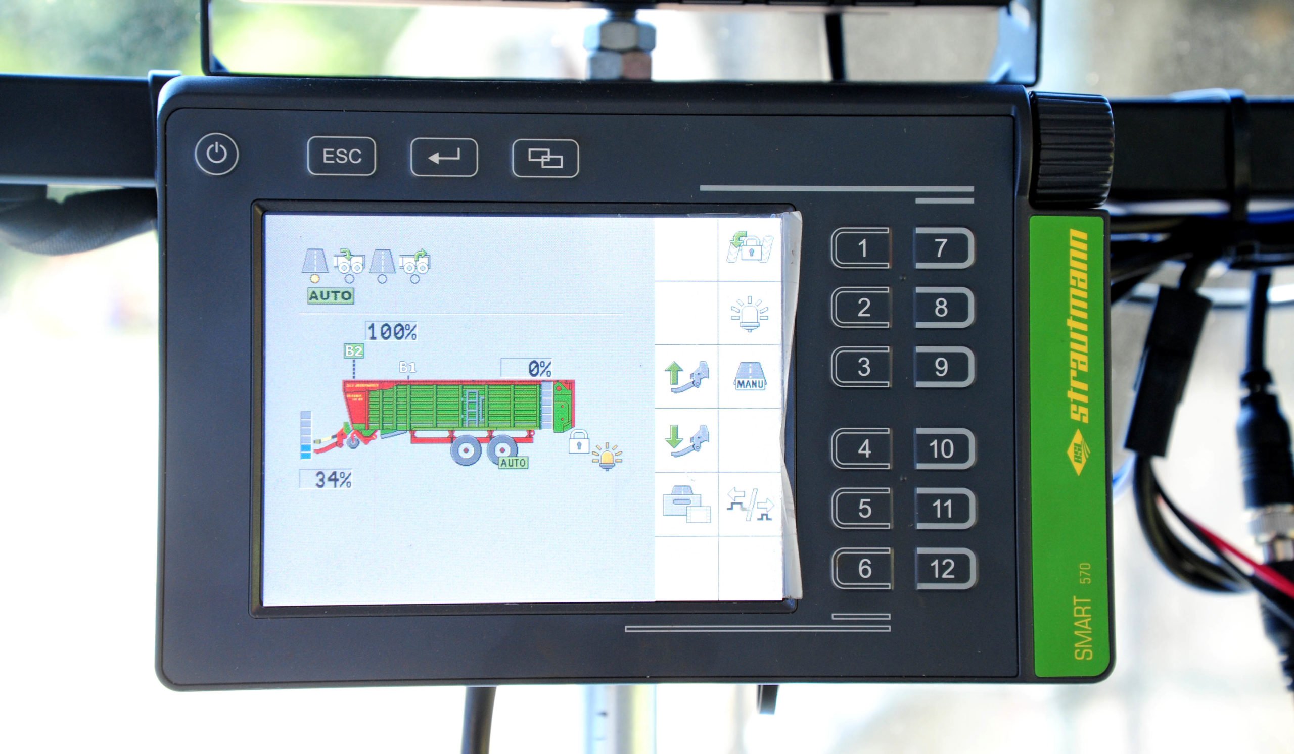 The control box has a touch panel screen and integrated membrane switches