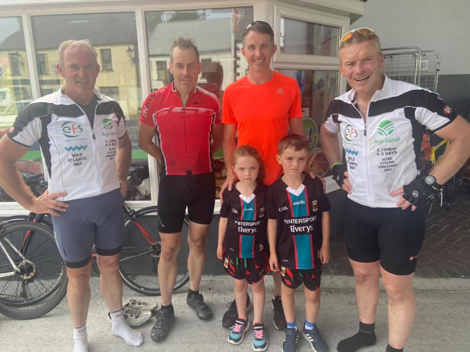 Cyclists greeted by Peadar Gardiner