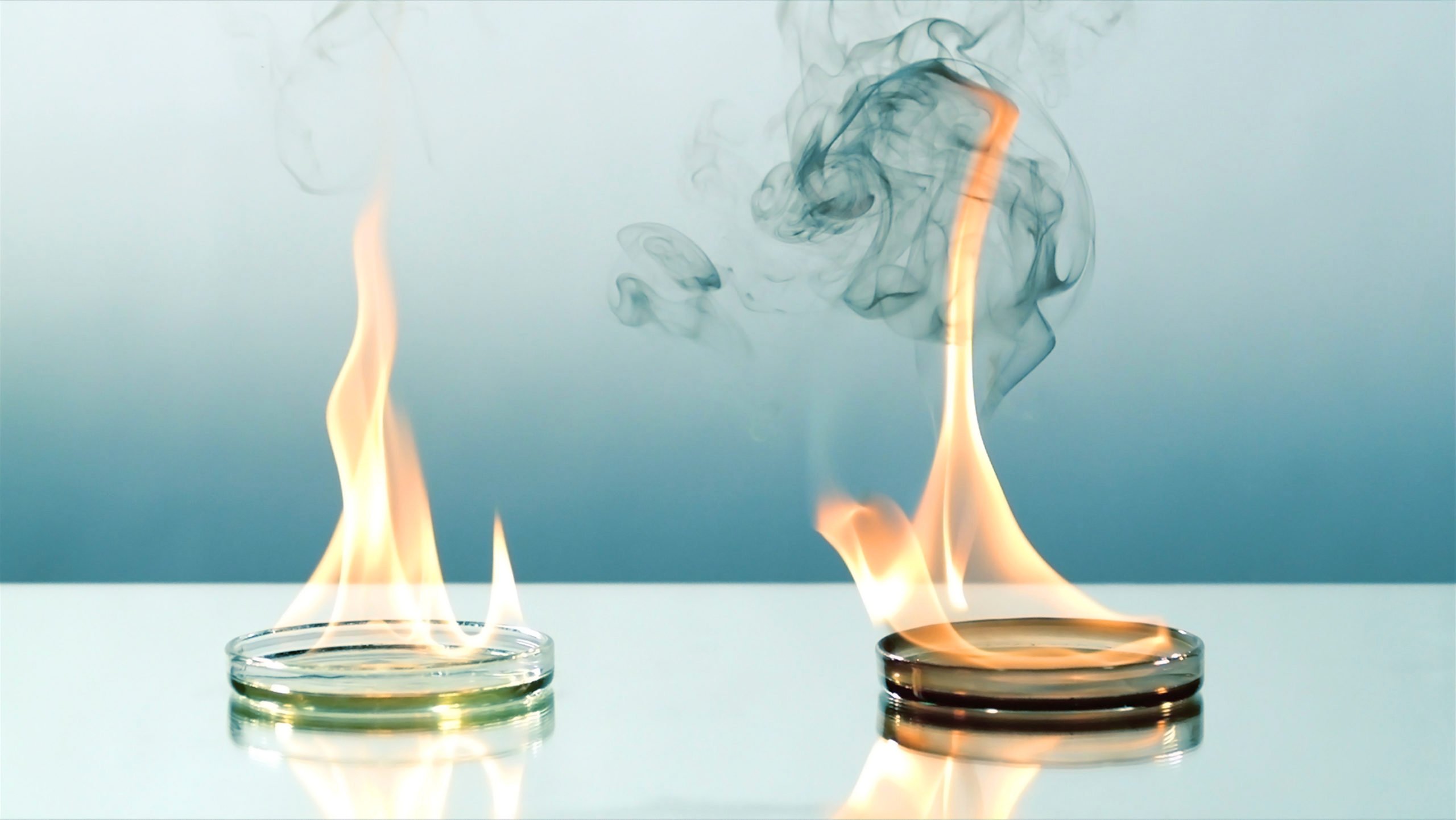 Neste synthetic diesel (left) has a cleaner flame than standard diesel (right)