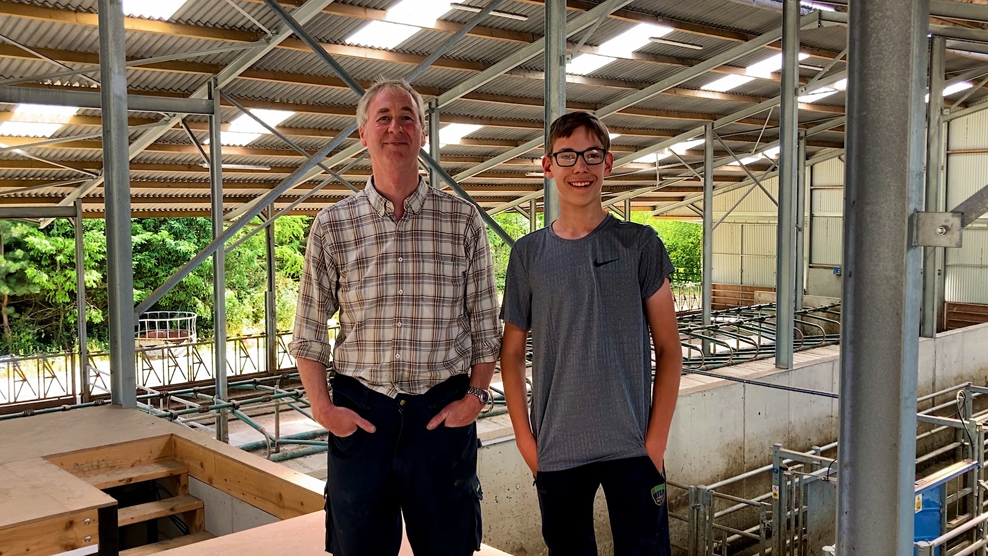 Karl with his son James. A big reason for going the dairy route was so that there was a future on the farm for James if he so wished to take over