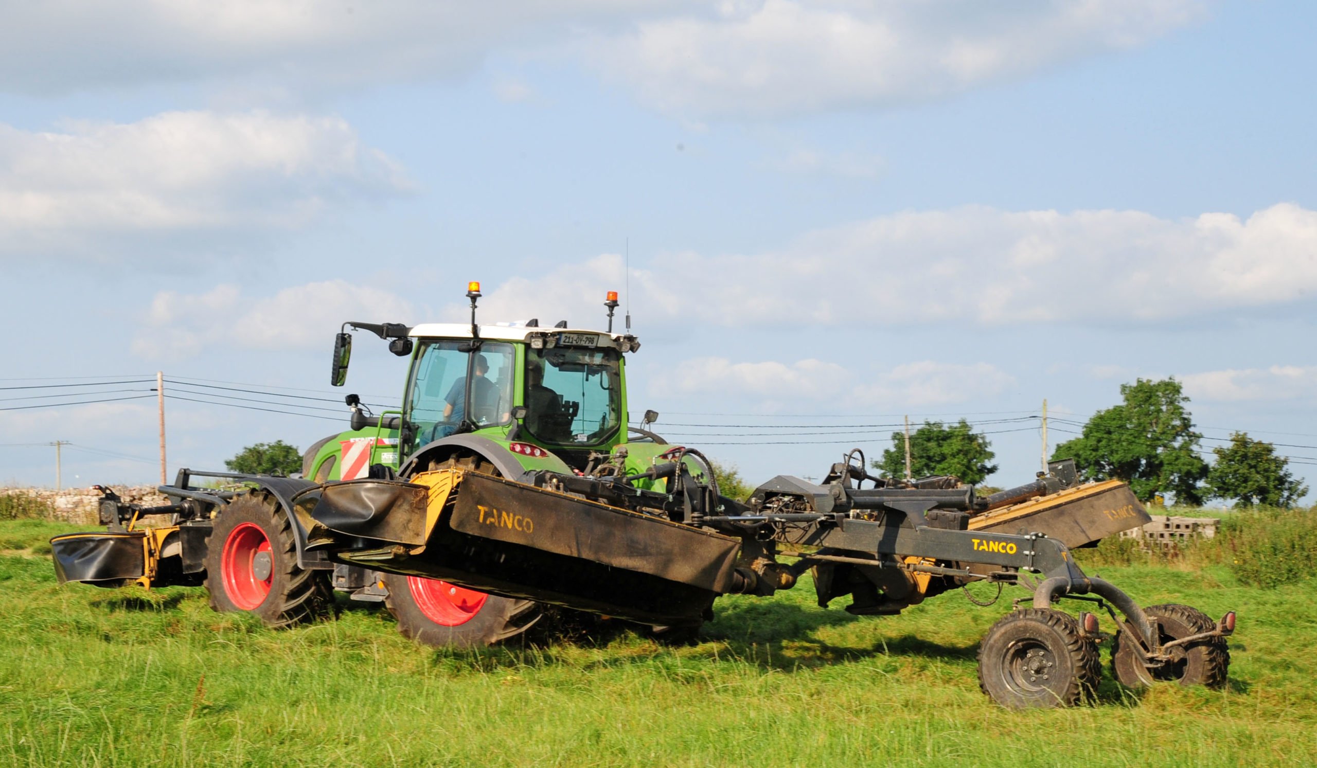 The weight of the mowers is split between the tractor and trailer wheels