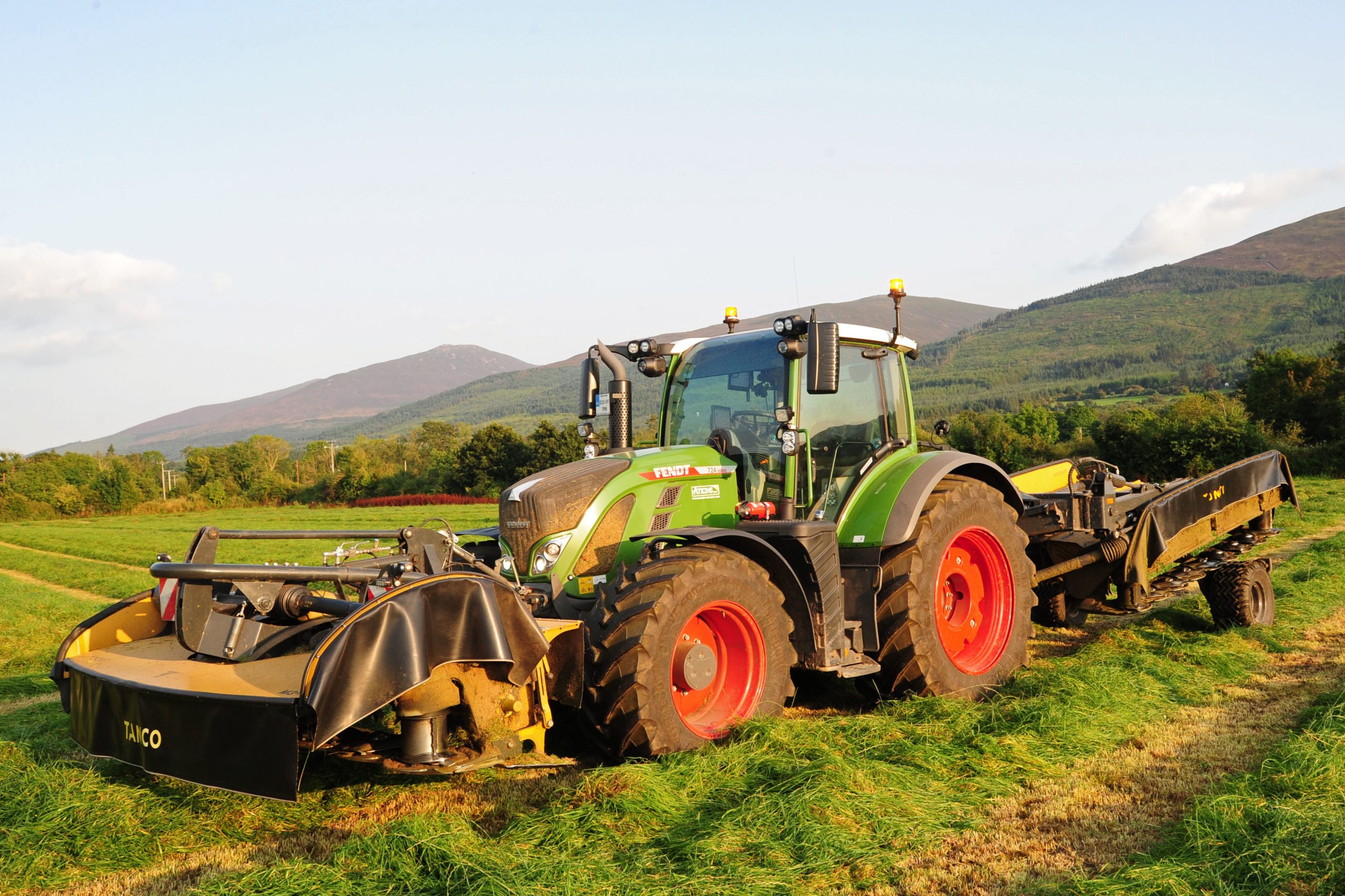 The two mower beds fold back alongside the frame for transport