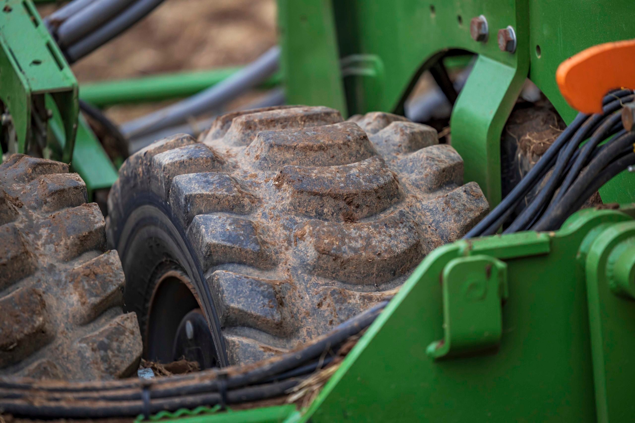 The tyres following the discs are patterned to consolidate the soil immedietly in front of the coulters