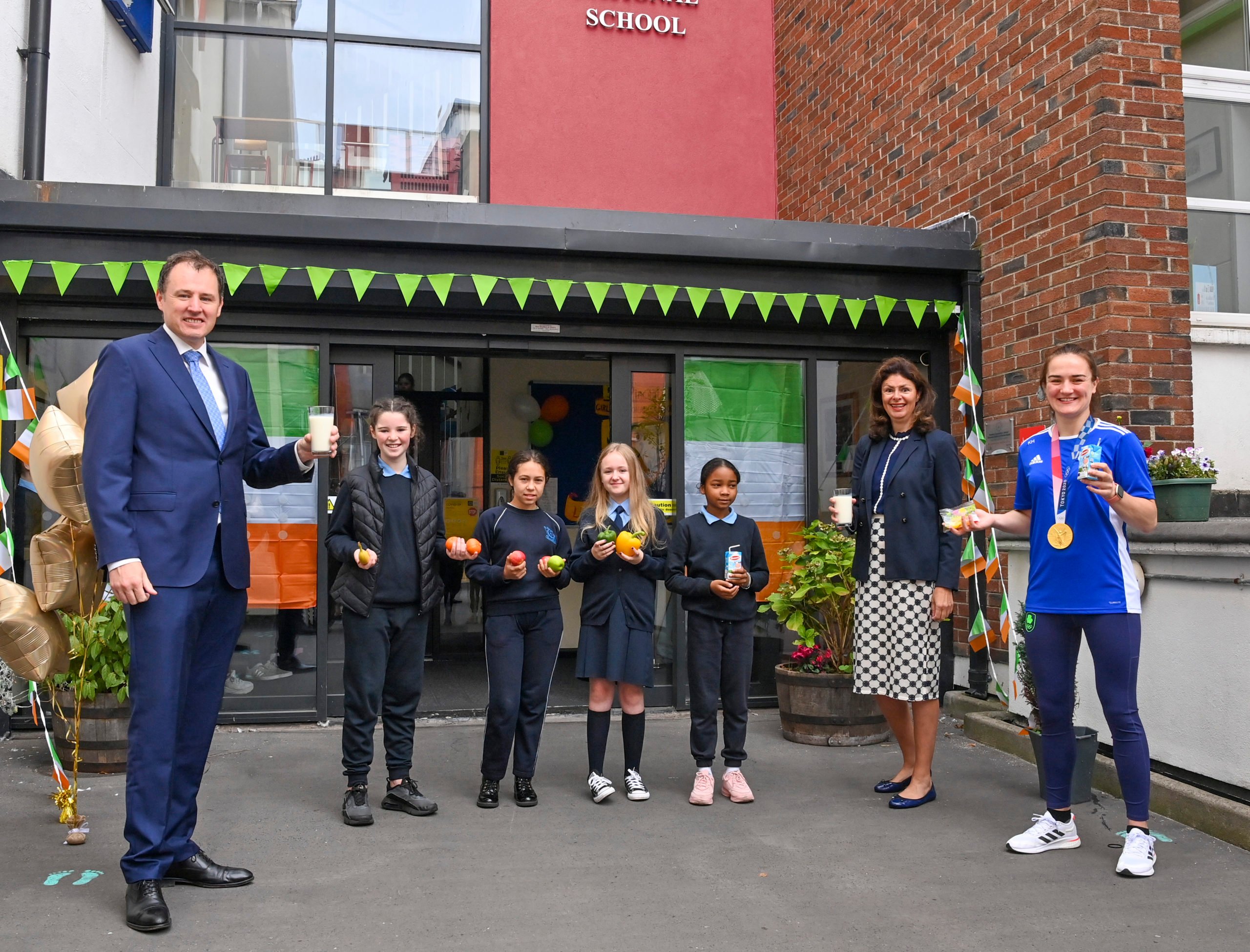Minister for Agriculture, Food and the Marine, Charlie McConalogue TD, Olympic Champion Kellie Harrington, and the National Diary Council’s CEO, Zoe Kavanagh were joined by pupils from St Vincent’s Girls National School. Image: Michael Chester