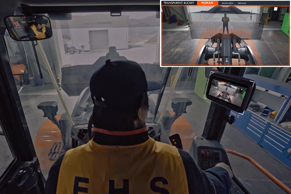 The driver is able to see ahead of the bucket via an in-cab monitor