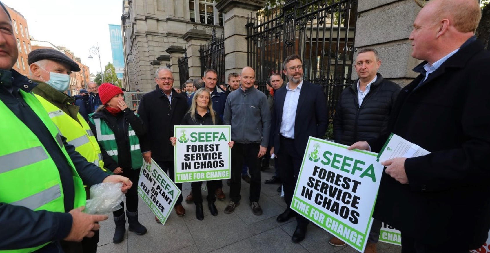 Members of SEEFA protesting outside government buildings. Image source: Finbarr O'Rourke