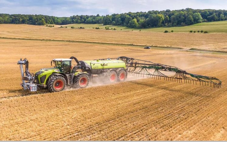 Claas Xerion with tanker at work in the Cotswolds