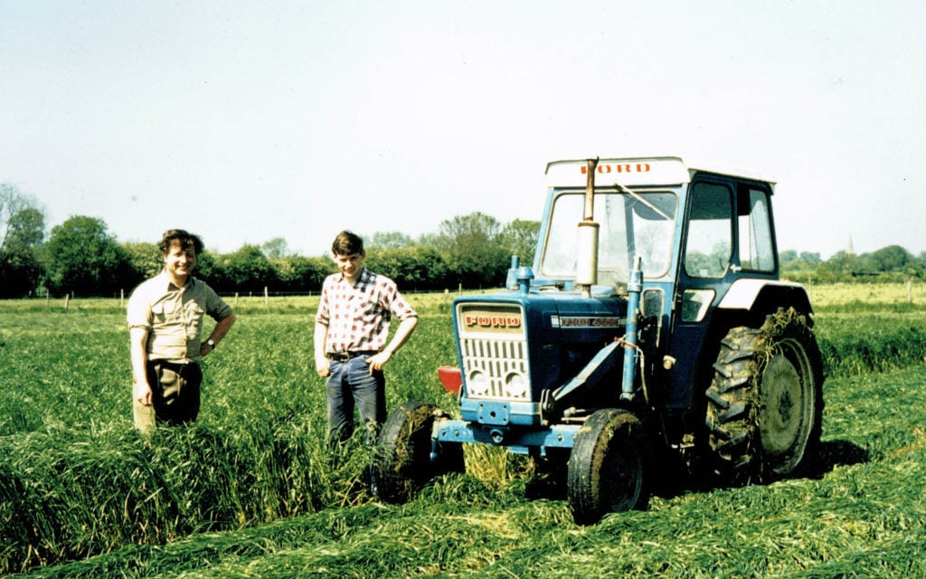Charlie's Ford 4000 mowing what looks like whole crop barley
