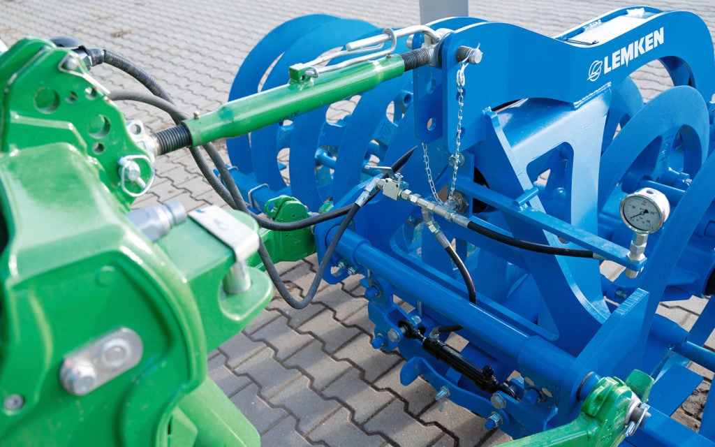 The furrow press automatically returns to its central position