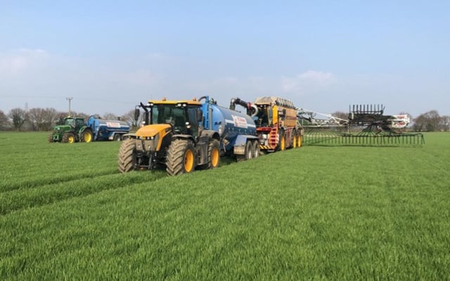 The 2017 Vredo 7028/3 self-propelled spreader being topped up in the field