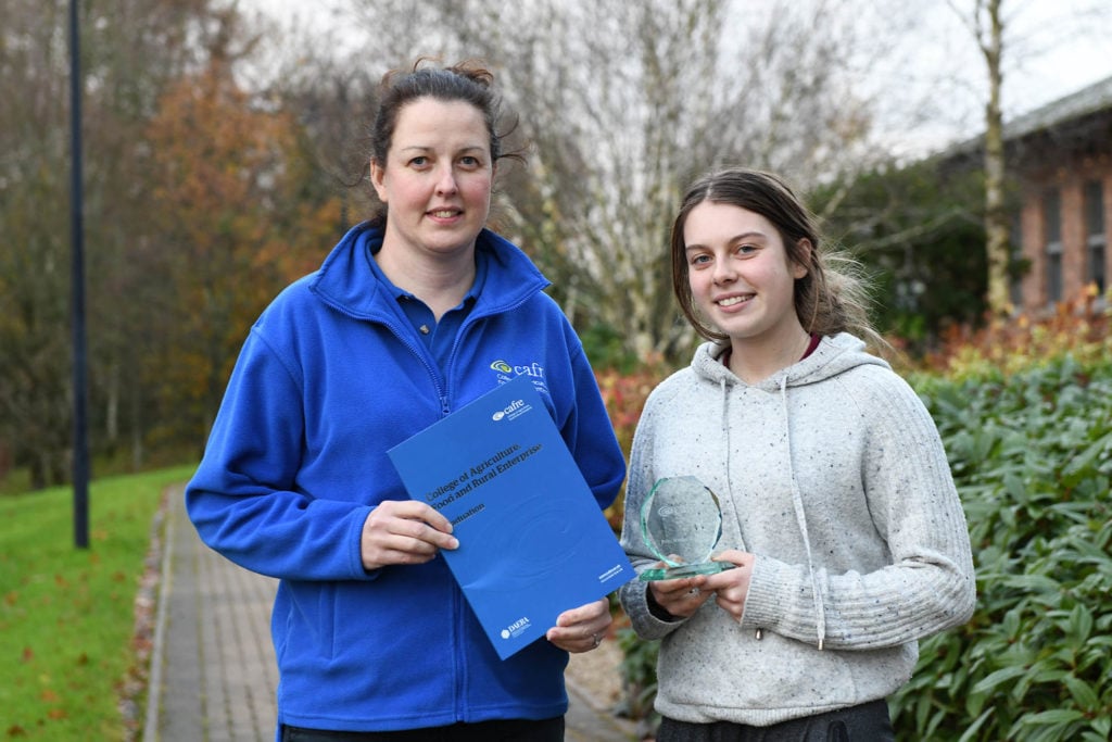 CAFRE Enniskillen Campus Level 3 Advanced Technical Extended Diploma student Boe Lynch, Irvinestown, receiving the Response Cup for the best performance in her first year practical assessment, pictured with Shelley Stuart (further education programme manager)