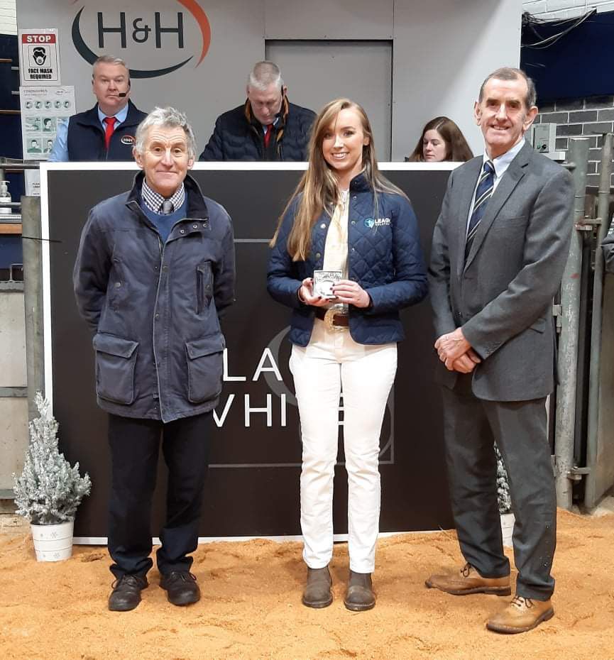 Lauren receiving silver buckle marketing award