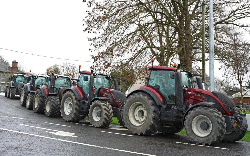 Maurice Gannon's fleet of Valtras ready to roll at the Church of the Risen Christ, Kiltoom
