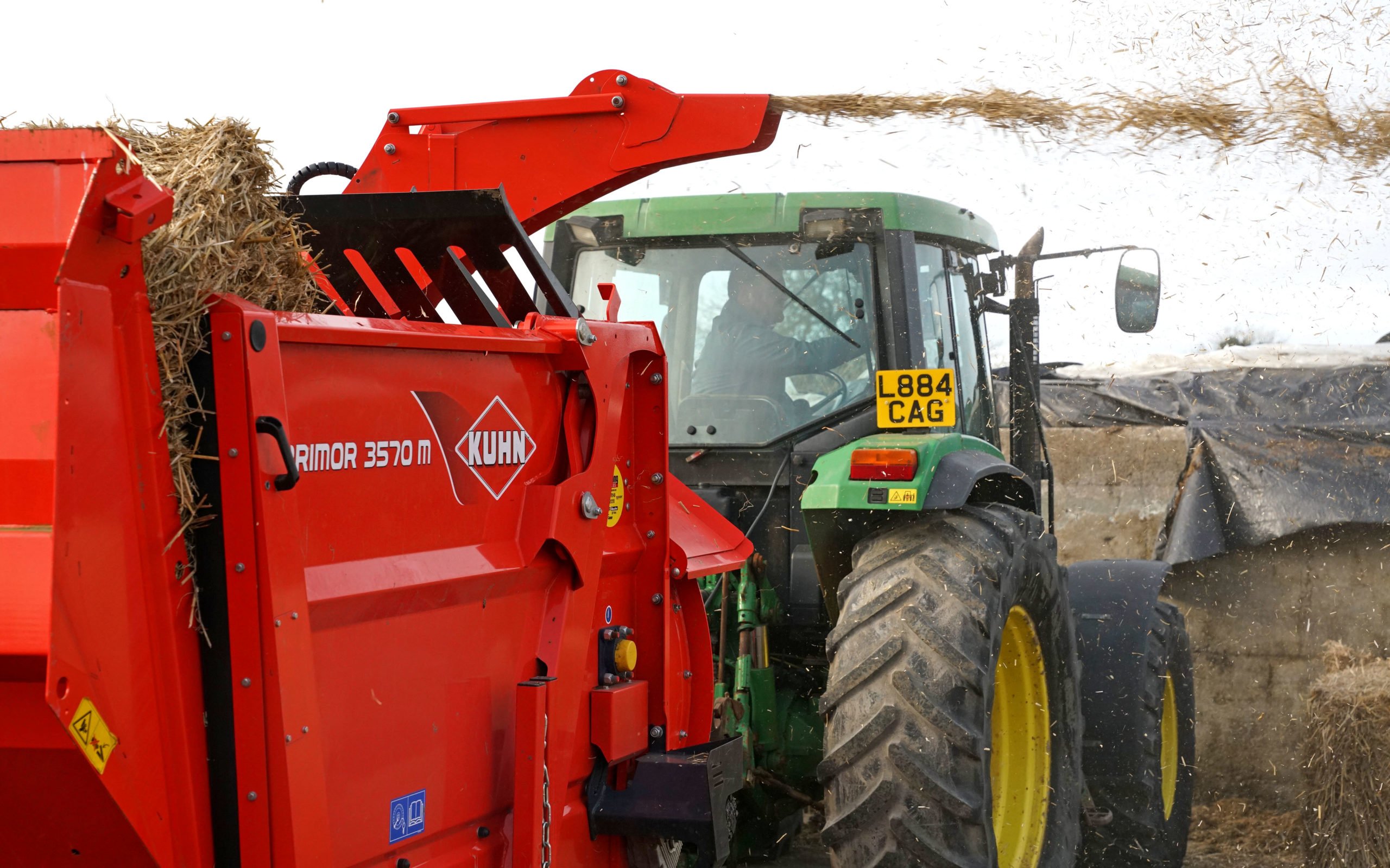 The straw blower has many uses, here it is breaking up a bale for use in the mixer wagon