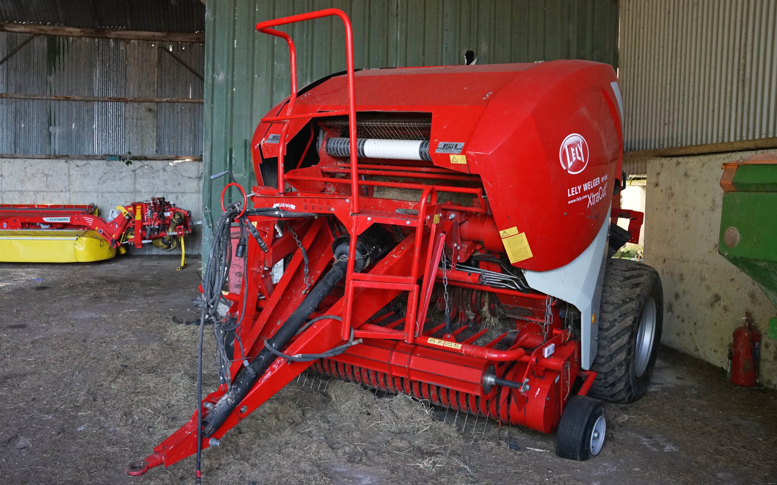 This Lely Welgar RP245 still has a full coat of paint on the pick-up bands. It was kept as a back-up machine