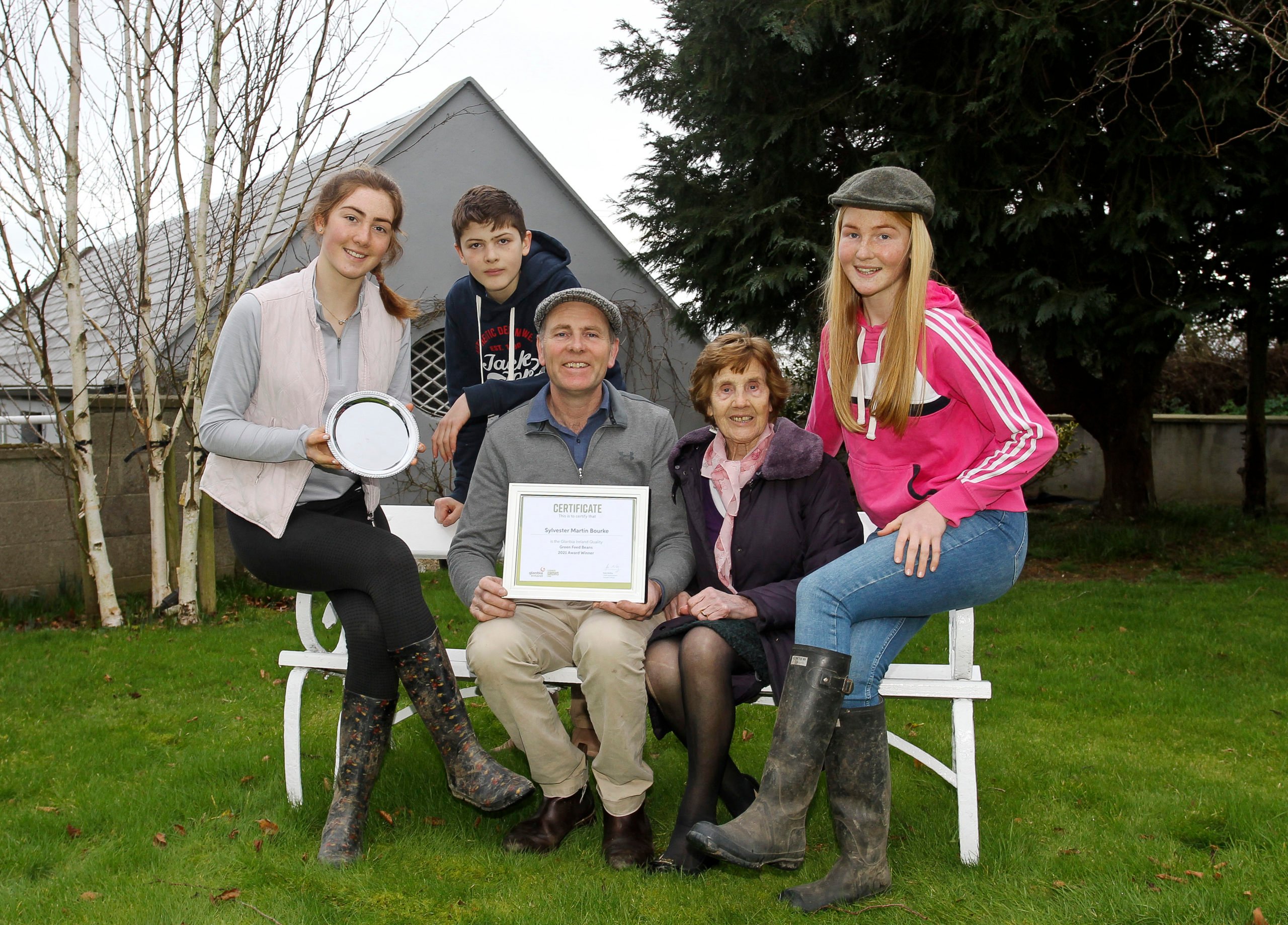 Sylvester Bourke (centre) with daughter Lizzie, son Sylvester jnr, his mother Molly and daughter Catherine after receiving his Green Feed Beans award from Glanbia Ireland