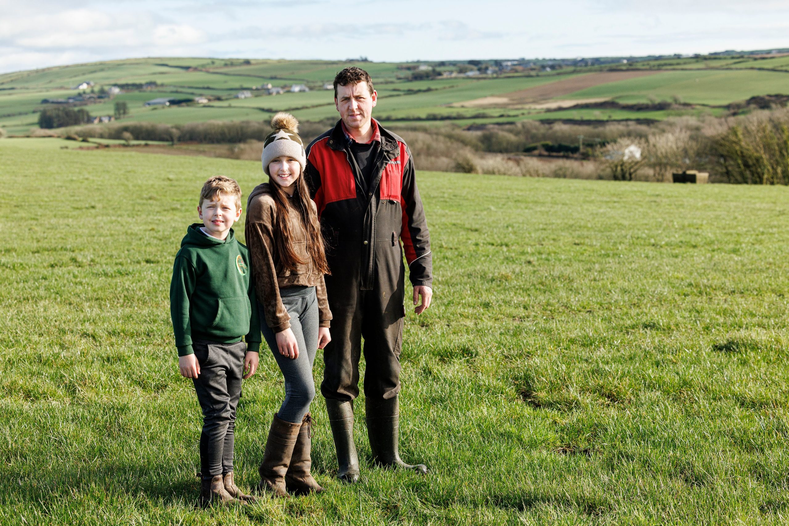 Michael Cahalane and his children on the farm