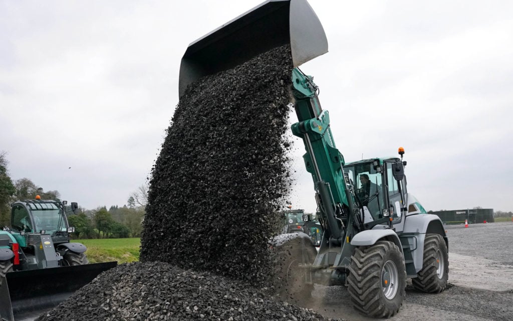 Rugged capability and good vision are the chief attributes of the loader format