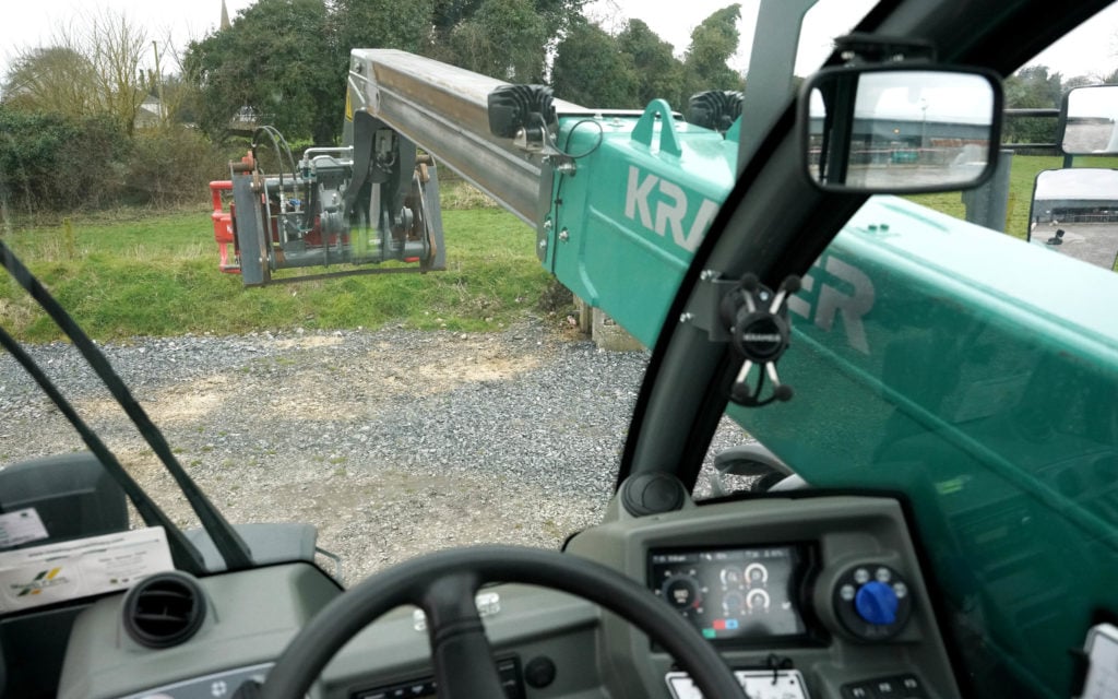 The cab mounted to the side of the boom, vision to the right is compromised, but reach and height is greater