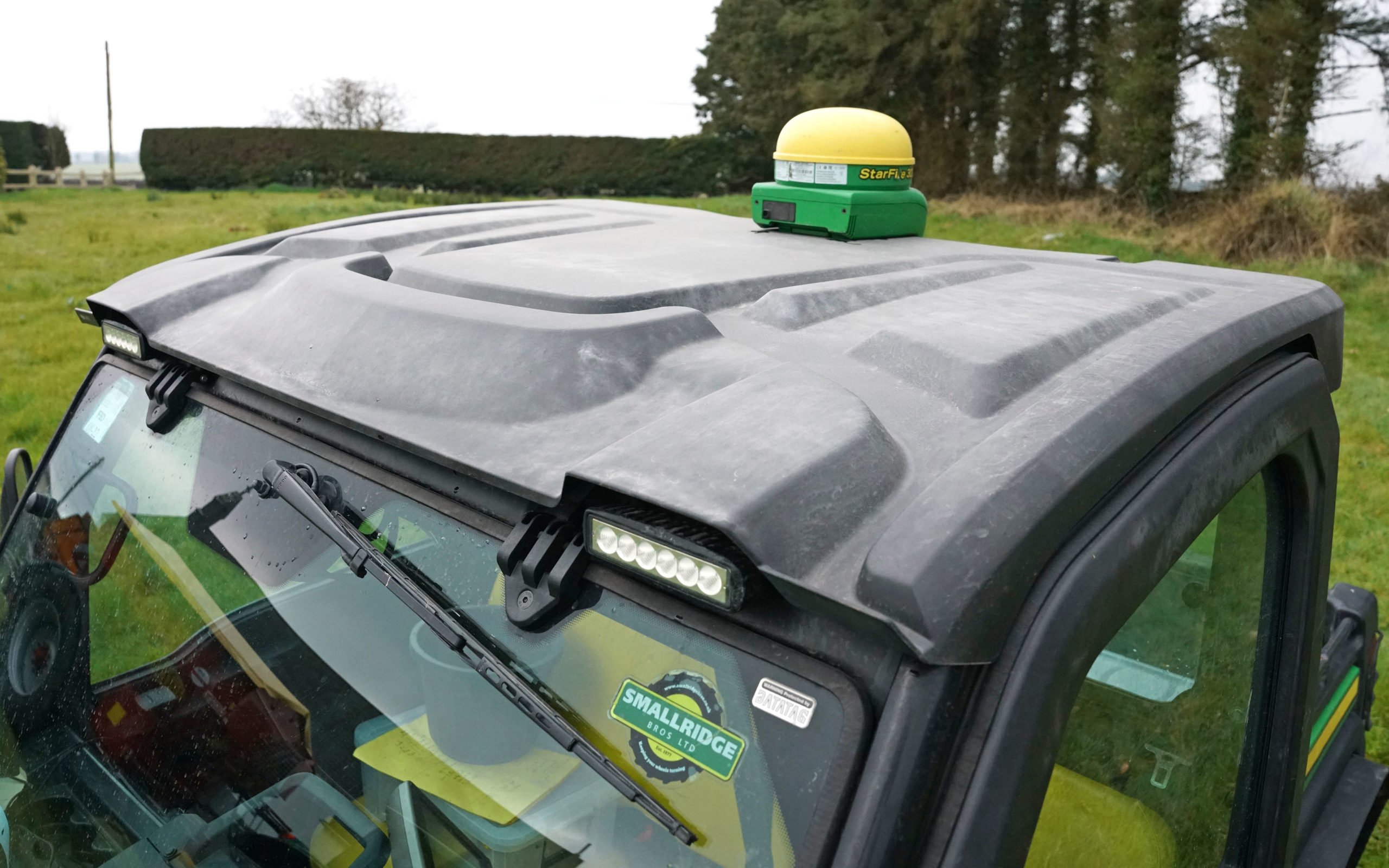 The Starfire 3000 receiver is mounted to the  Gator's roof for mapping.