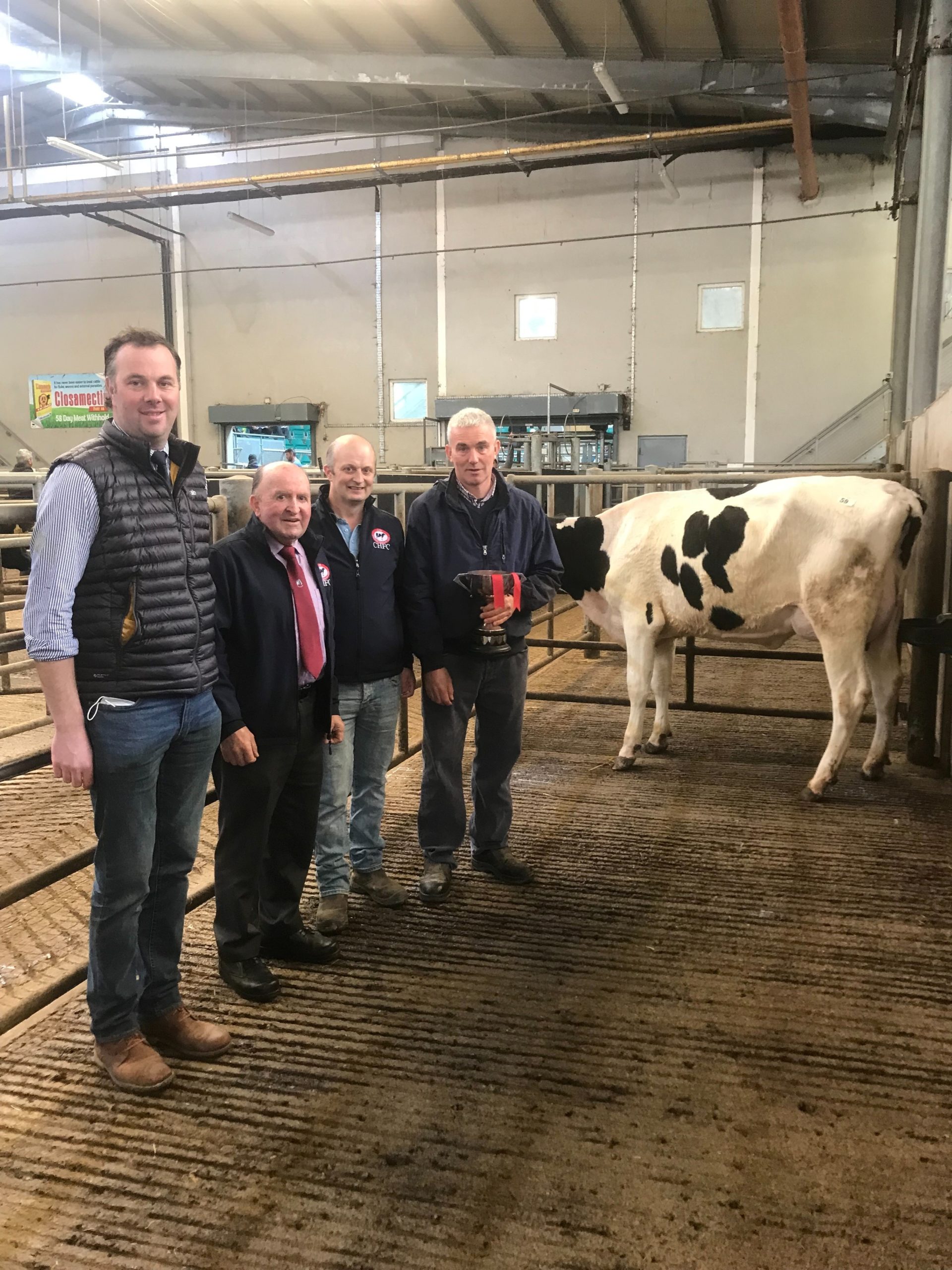 Judge James Crowley, club president Pat Hayes ,club chairman Ivor Bryan and owner of champion heifer Ricky Barrett(Image source: CHFC)