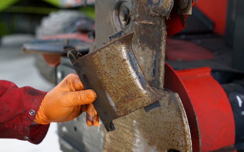 Replaceable skid sections prolong bed and blade life