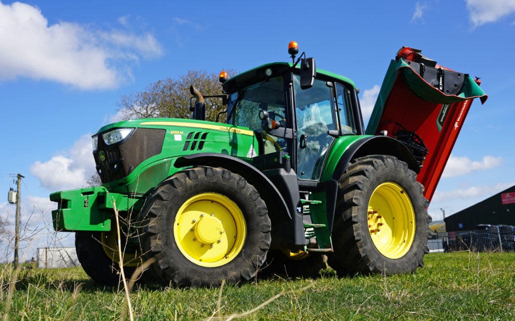 A tractor of around 150-160hp will easily handle the weight of the mower
