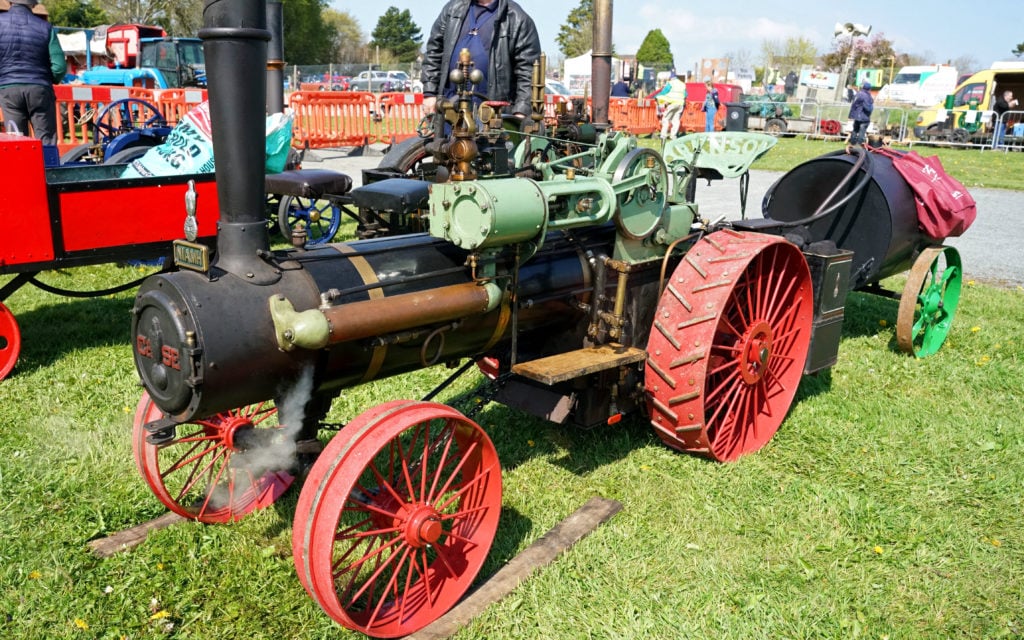 A third scale model of a Case traction engine neatly shows off the long lines of these machines