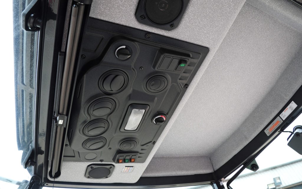 The cab ceiling has a full set of air vents for the heater fan. A radio is not included, which is normal in the construction world
