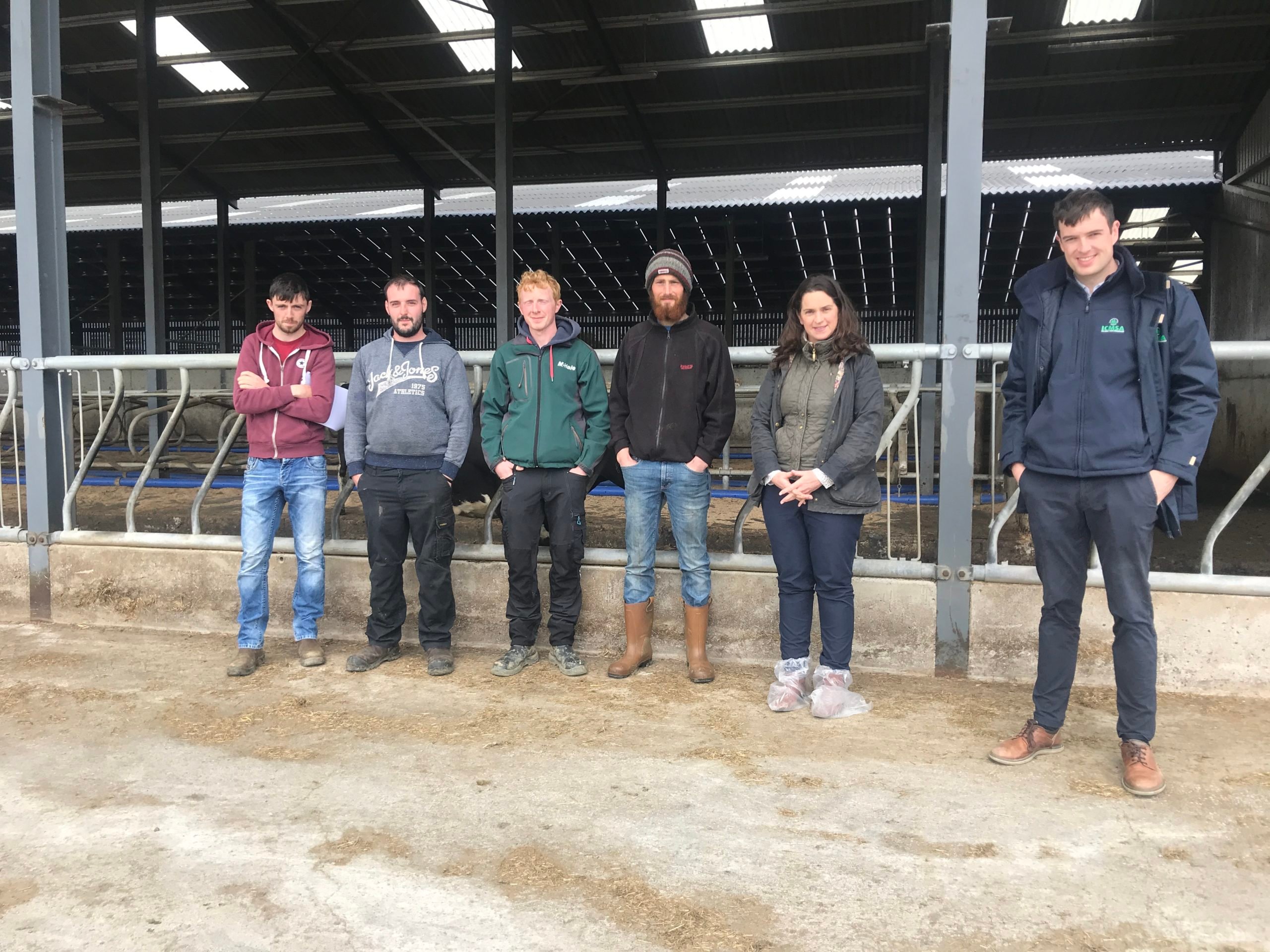 Michelle McGrath from AHI and Ronan O'Connor from ICMSA, along with a number of young farmers that attended the event