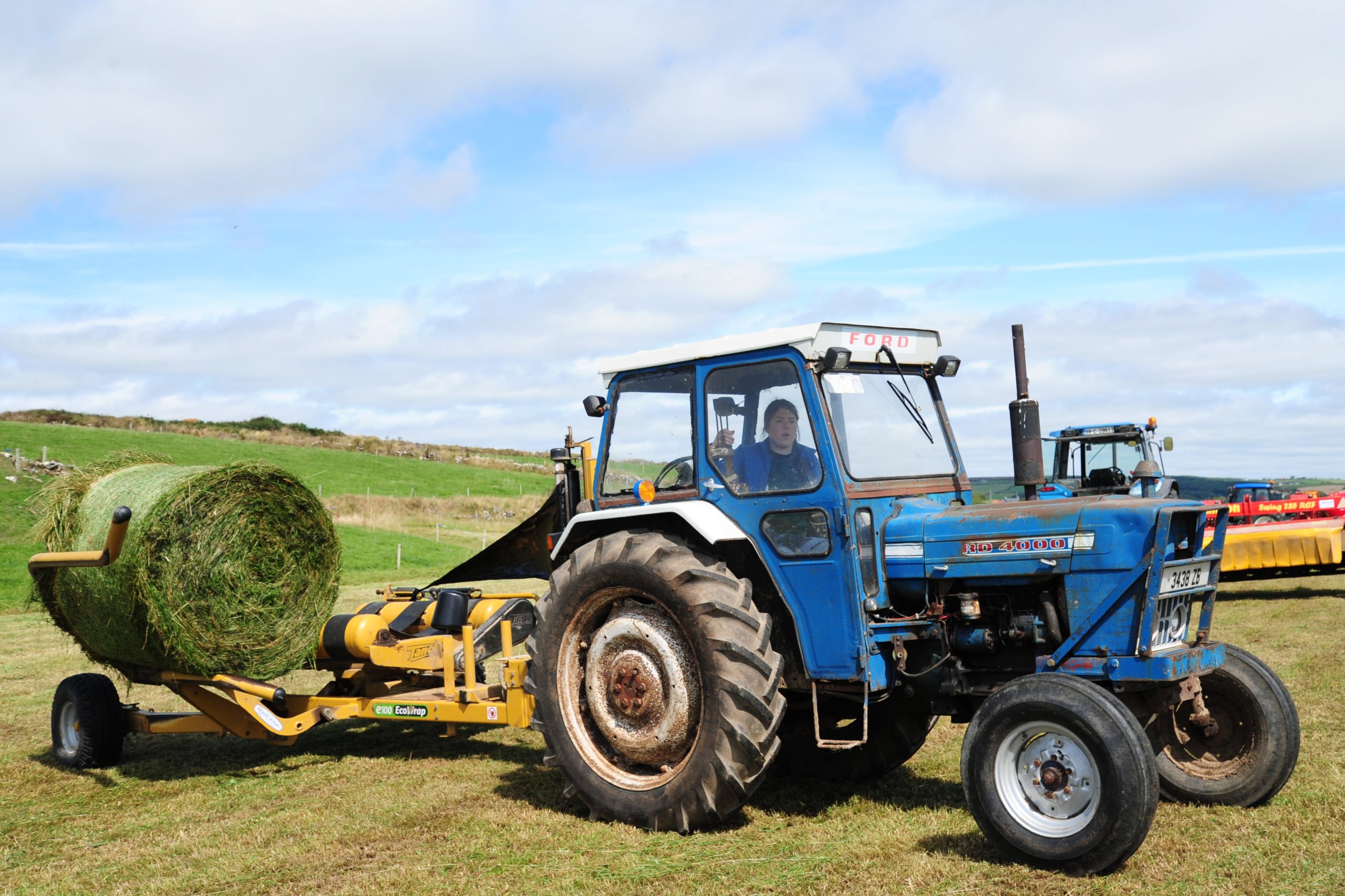 Wrapping the bale separately involves another operation, but it allows choice of baler type