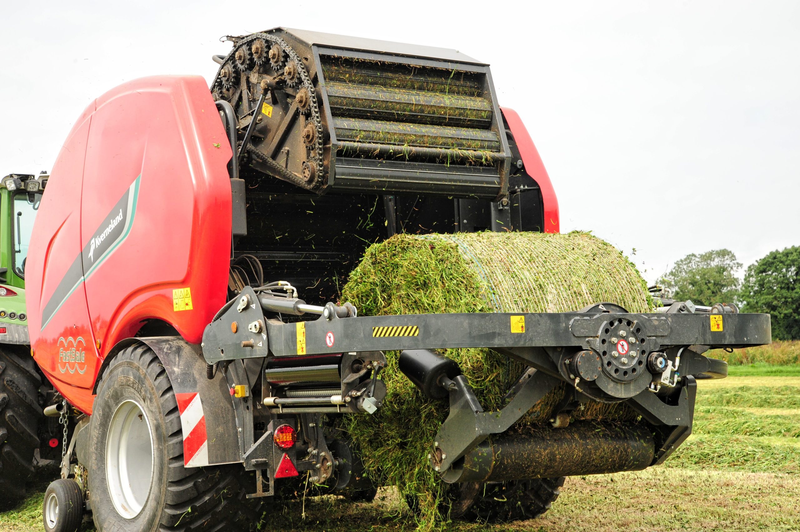 The Kverneland Fastbale offers a half way house by wrapping a small tight bale within a larger one