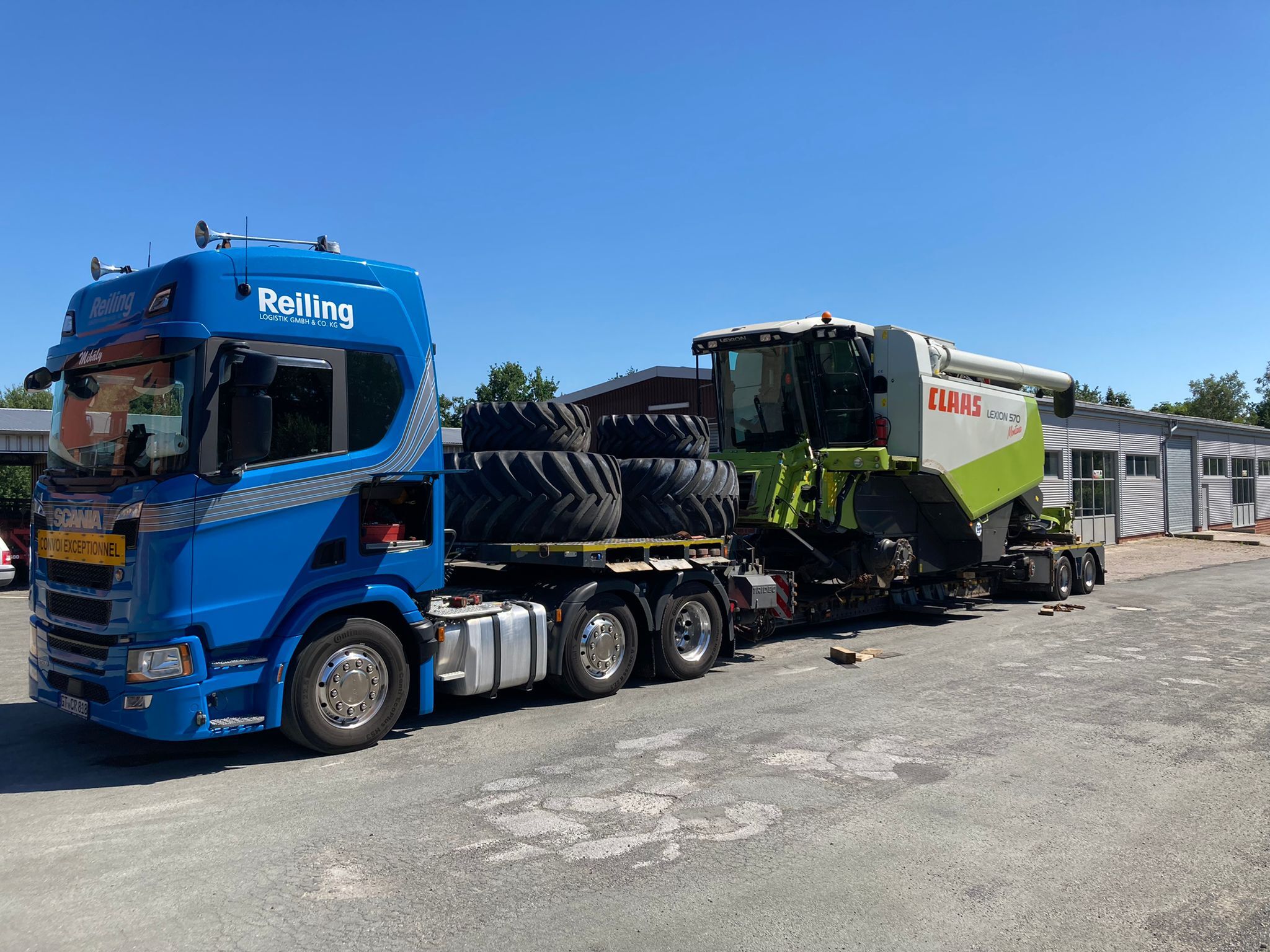 Transporting combines is complicated, but E-FARM has years of experience in providing international delivery