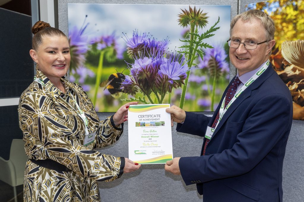 Professor Frank O’Mara Teagasc director and Fiona Hutton, overall winner of Teagasc’s Research and Innovation photo competition 2025