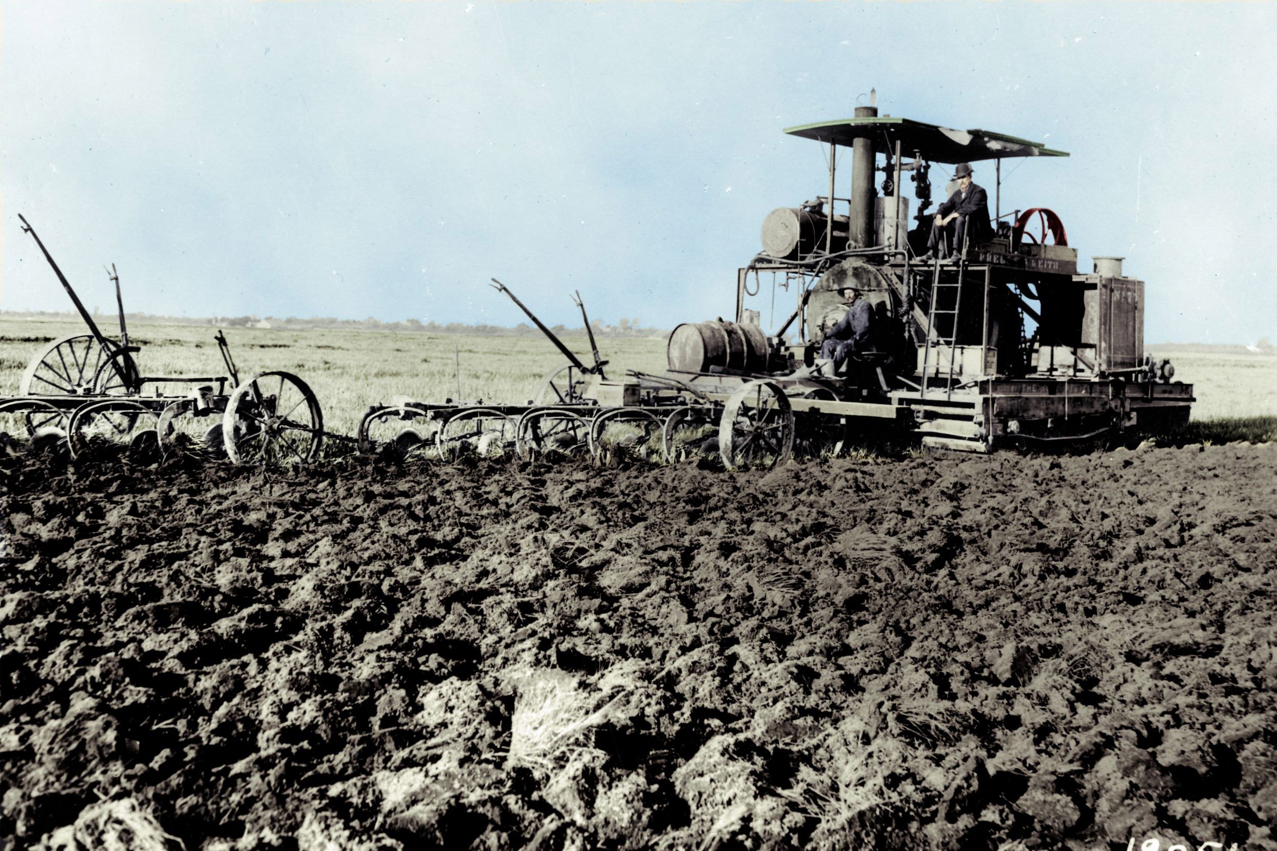 A Holt 'steamer' pauses for a photograph as it ploughs a western prairie