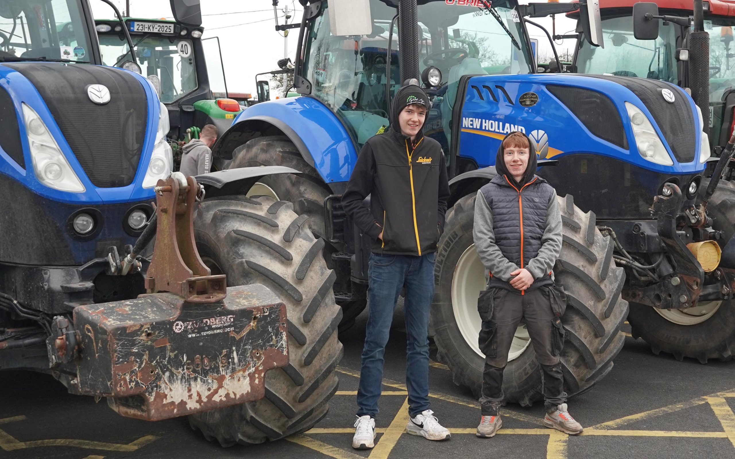 (L-r) Daire McCarthy and Nathan Murray with a pair of T7.210s belonging to local machinery importer and contractor Egmont Agri