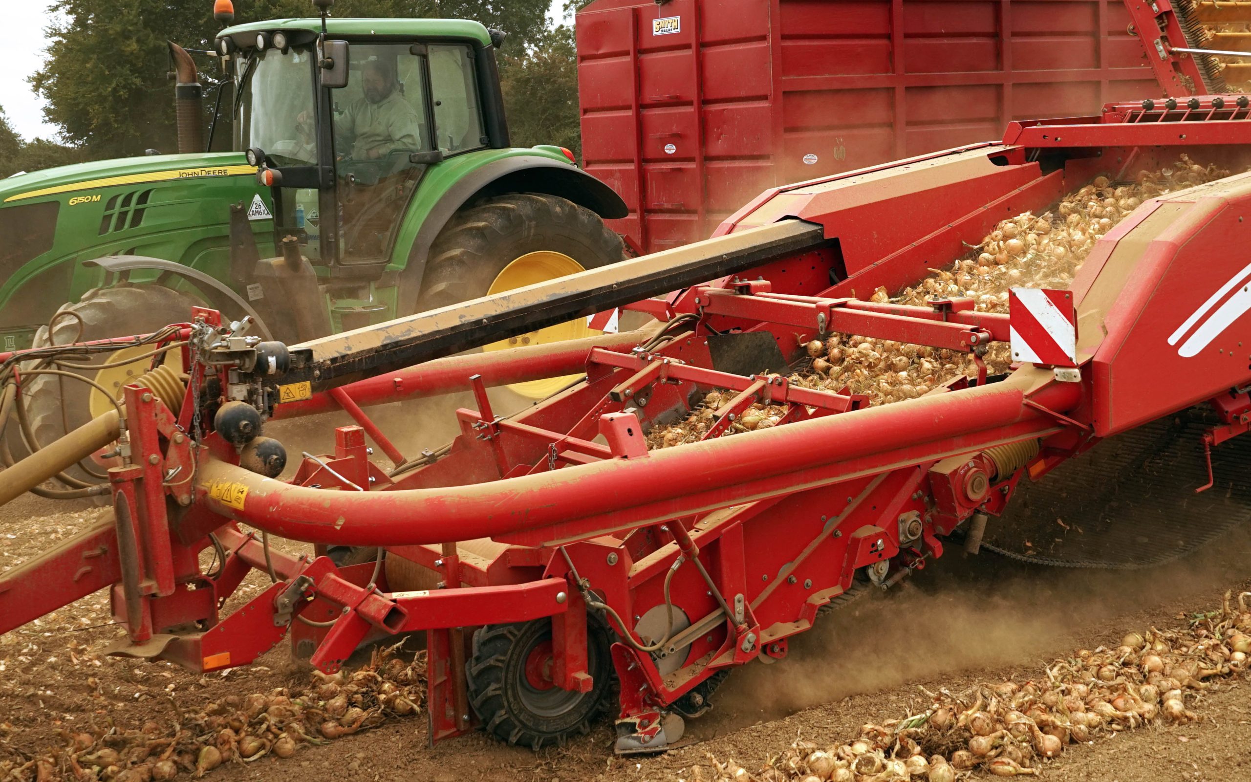 The harvester pick-up has been adapted to better work with an onion crop